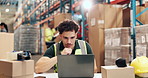Laptop, thinking and typing with man in logistics warehouse for distribution or shipping update. Computer, problem solving and supply chain with person in storage depot for agenda or schedule