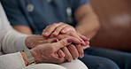Holding hands, support and nurse with person in home for comfort, compassion and unity for trust. People, hope and healthcare worker with cancer patient for consultation with kindness in house.