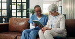 Consulting, healthcare or tablet with nurse and old woman on sofa in living room of home. App, conversation or medical results with caregiver and senior patient in apartment for feedback or review