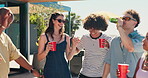 Friends, drinking and dancing at party in backyard for social gathering, bonding and hangout together. Happy, people or alcohol with movement at new years event for celebration, summer holiday or fun