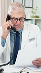 Telephone call, doctor and man with document for healthcare, talking or telehealth in clinic. Landline, mature professional and medical paper for consultation, test results and wellness report