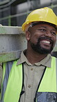 Construction site, carry or black man with material for building, instructions or infrastructure project. Industrial architecture, smile or supervisor talk for development orders, concrete or builder