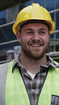 Construction, ppe and man on site with smile, work pride and experience in building maintenance. Happy, dedication and contractor with hardhat, confidence and profession in infrastructure development