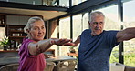 Yoga, warrior pose and senior couple in morning for mindfulness, wellness and flexibility. Retirement, marriage and mature man and woman stretching arms for balance, health and exercise together
