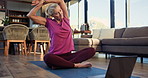 Woman, stretching and laptop on mat, home and exercise routine in living room, warm up and wellness. Healthy, mature person and workout preparation on floor, online and tips for pilates on website