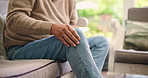 Elderly man, hands and knee pain with injury for arthritis, fibromyalgia or muscle tension on sofa. Closeup, senior or male person with sore bone, discomfort or joint inflammation for bruise or ache