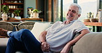 Laughing, face and man in lounge, chill and comfortable on couch, relax and happy on break and home. Mature person, smile and resting for me time on sofa, confident or stress free on weekend in USA