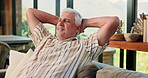 Relax, thinking and senior man on sofa in home for chilling, comfortable and enjoy calm on Sunday afternoon. Retirement, morning and mature person on couch for resting, lazy and peace in living room