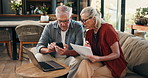 Finance, laptop and old couple in home with phone for online banking, digital payment and savings. Retirement, smartphone and elderly man and woman with bills for pension, budget planning and taxes