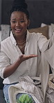 Influencer, black woman and talk in home with clothes haul, live stream and social media marketing. Content creator, person and chat in house with broadcast, video and review for fashion sponsorship.