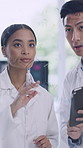 Research, tablet and people with glass wall, science and teamwork for experiment. Scientist, medical and man with woman, tech and discussion with test results, clinical trial and dna analytics