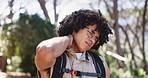 Hiking, travel and man in forest, neck pain and countryside with environment. Nature, person and hiker in woods, inflammation and anatomy problem with wellness, bruise or muscle tension with ache