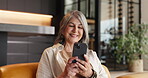 Couch, reading or senior woman with phone in home, social media or check message notification. Watch video, pensioner blog or old person smile for retirement forum post, relax or browsing internet