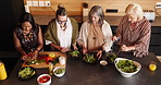 Above, kitchen and mature women with salad for bonding, conversation and culinary lesson. Cooking class, social reunion and senior friends with lunch, discussion and food for learning recipes in home