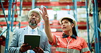 Man, woman and tablet with team discussion at warehouse, logistics or point for shipping solution. People, inspection and talk with tech, application and inspection with storage at distribution plant