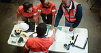 People, construction and meeting with handshake in warehouse above for supply chain expansion. Top view, group or team shaking hands with documents for building plan or storage improvement in depot