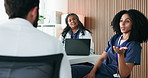 Woman, talking and doctors in meeting, healthcare and feedback for hospital schedule. People, medical service and employees in clinic, discussion or review for medicare support and compliance agenda