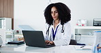 Woman, doctor and typing with laptop in office for research, medical report and compliance form. Person, pc and documents for Telehealth, healthcare schedule and information for treatment planning