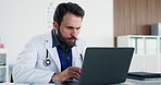 Man, doctor and reading with laptop in office for research, medical report and patient history. Male person, pc and information for Telehealth, healthcare records and planning for treatment procedure
