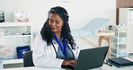 Black woman, doctor and reading with laptop in office for research, medical report and schedule. Mature person, pc and document for Telehealth, healthcare records and planning for treatment procedure