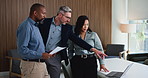 Pointing, laptop and business people in meeting for finance review, feedback and investment in office. Corporate, team and workers pointing to tech for financial report, budget planning and proposal
