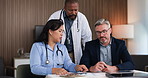 Doctors, team and discussion in boardroom with documents, budget and meeting at hospital. Medical director, group and people with paperwork, feedback or financial planning for healthcare services