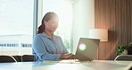 Businesswoman, typing and research in office with laptop for finance report, budget proposal and review. Flare, bokeh and person browse in workplace with computer, financial management and planning.