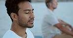 Meditation, breathing and zen with men at beach for mindfulness, spiritual balance and health. Chakra, relax and yoga routine with people outdoor for holistic wellness, peace and fitness on coast