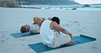 Yoga, stretching and health with men at beach for fitness, holistic wellness and spiritual balance. Warm up, healing routine and self care with people outdoor for zen practice, peace and awareness