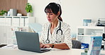 Medical, typing or woman in hospital with laptop, agenda check or patient review in online consulting. Healthcare, digital or doctor with tech, telehealth or surgery schedule in treatment plan.
