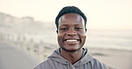 Face, fitness and black man with smile by beach, workout break and training for body development goals. Laugh, exercise stop and athlete with physical activity on promenade, wellness and confidence