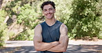 Face, fitness and smile with man outdoor for health, wellness and laughing with confidence. Portrait, arms crossed and happy person in nature for exercise, active athlete and funny runner in Portugal