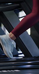 Sneakers, treadmill and woman in gym, fitness and running for health benefits, challenge and balance. Machine, person and athlete in wellness center, endurance and exercise with shoes and steps