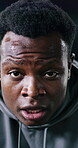 Tired, breathing and fitness with face of black man in gym for intense workout, cardio fatigue and recovery. Exercise burnout, exhaustion and health with person in sports center for sweating