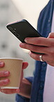 Person, hands and coffee and phone in city for website, social media update or check text message. Man, hot beverage and scroll outdoor with tech, mobile app or online chat for digital communication.