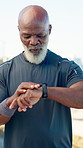 Smart watch, fitness and mature black man in nature for tracking heart rate with running training. Sports tech, outdoor and African male person checking calories for cardio, workout or exercise.