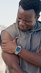Active, black man outdoor and shoulder pain from exercise challenge, difficult workout or medical issue. Hurt, person and athlete with joint inflammation, strain or muscle tension from sports injury.
