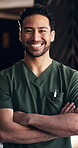 Face, nurse and man with arms crossed, clinic and happy for medical services and career development. Confident, healthcare worker and person with smile for opportunity to help, flare and wellness
