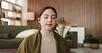 Calm, woman or breathing exercise with meditation in home for mindfulness or spiritual wellness. Female person, relax and eyes closed with inner peace for stress relief, balance or awareness in house