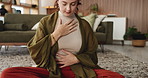 Woman, zen and breathing exercise with meditation for mindfulness or spiritual wellness in home. Female person, relax or calm with eyes closed for inner peace, balance or awareness on floor in house