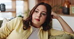 Lonely, woman and thinking in lounge, serious and stress for decision, remember and sad for break up. Home, reflection and person with worry for relationship failure, mental health or anxiety on sofa