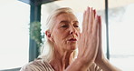 Breathing, meditation and yoga with woman in studio for balance, mental health or wellness. Exercise, relax and zen with mature person in prayer pose for awareness, inner peace or mindfulness routine
