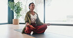 Woman, yoga and meditation in studio with peace, spiritual awareness and chakra alignment for wellness. Zen, mature person and yogi with lotus pose, grounding exercise and mindfulness for self care.