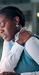 Shoulder pain, tired and night with business black woman in office for stress, burnout and deadline pressure. Fatigue, exhausted and overworked with person for mental health, bokeh and injury