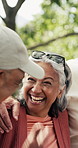 Old people, conversation and laughing outdoor with hug, funny story and bonding together on weekend. Happy, senior woman and man in park with discussion, retirement joke and friends embrace for fun.