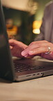Hands, laptop and typing with business person at desk in office for planning or research at night. Computer, feedback and report with employee in dark workplace for deadline, overtime or schedule