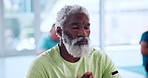 Senior man, breathing and zen with meditation in class for yoga, spiritual wellness or mindfulness. Elderly, male person or session with inner peace for awareness, chakra or mudra in health club