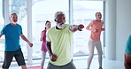 Boxing, fitness and class with old man in studio for mobility workout, health and joint friendly exercise. Wellness, learning and senior training group with people in club for cardio and hobby