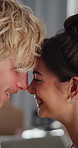 Happy, nose touch and couple in home with love, bonding and marriage connection in living room. Smile, romantic and man with woman for affection in relationship together with tender moment in house.