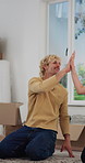 Happy couple, boxes and rolling carpet with high five for new home, help or interior decor together. Man, woman or homeowners with rug, mat or teamwork for fun renovation or improvement in house